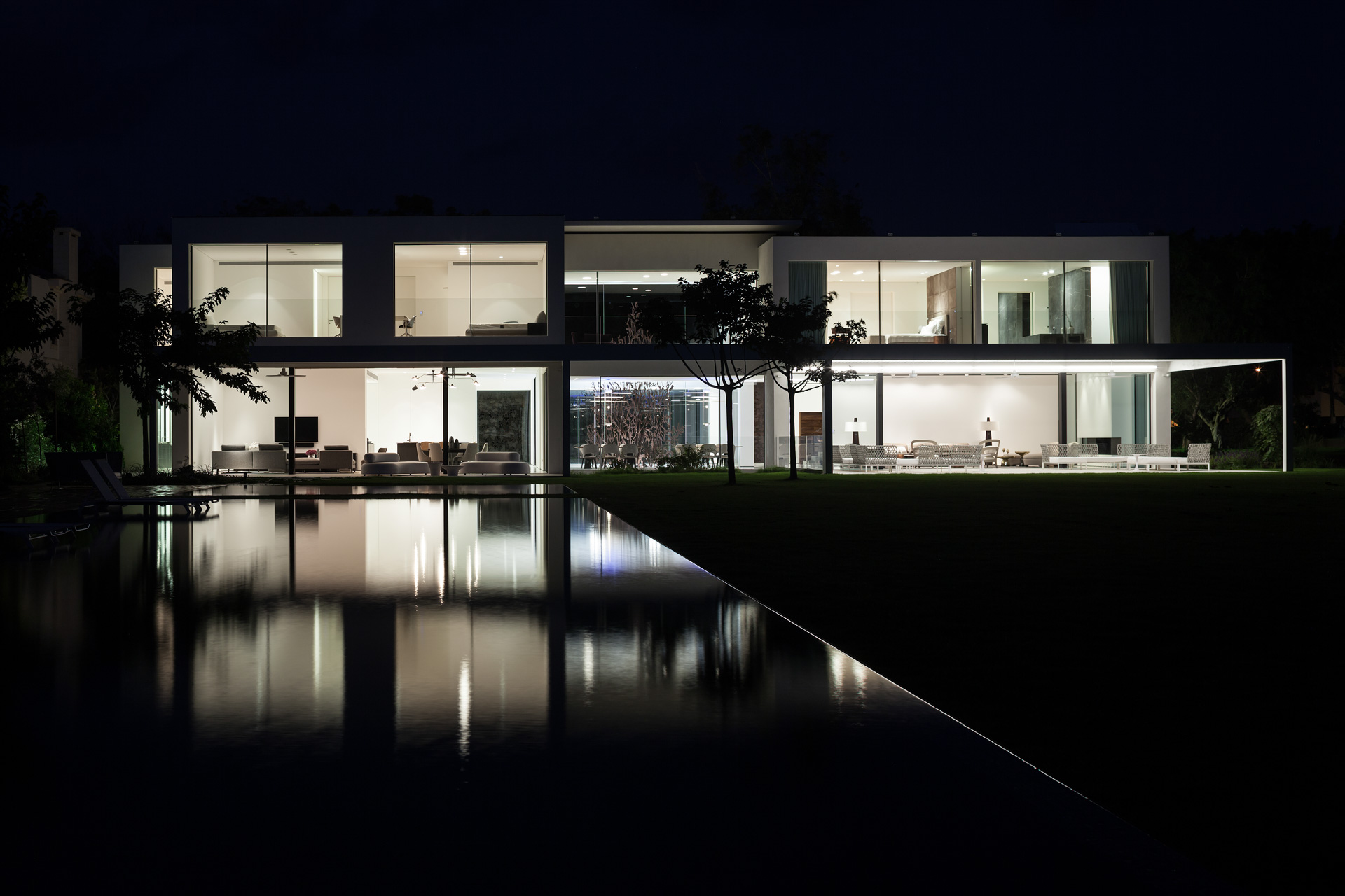 modern white house by night